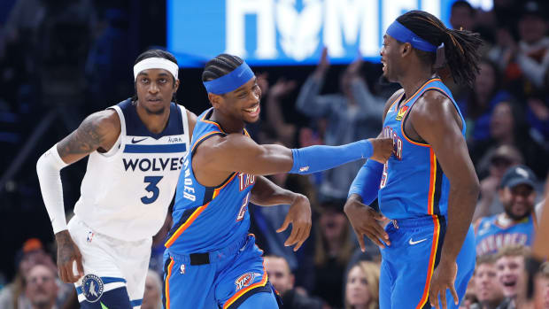 Shai Gilgeous-Alexander and Luguentz Dort celebrate